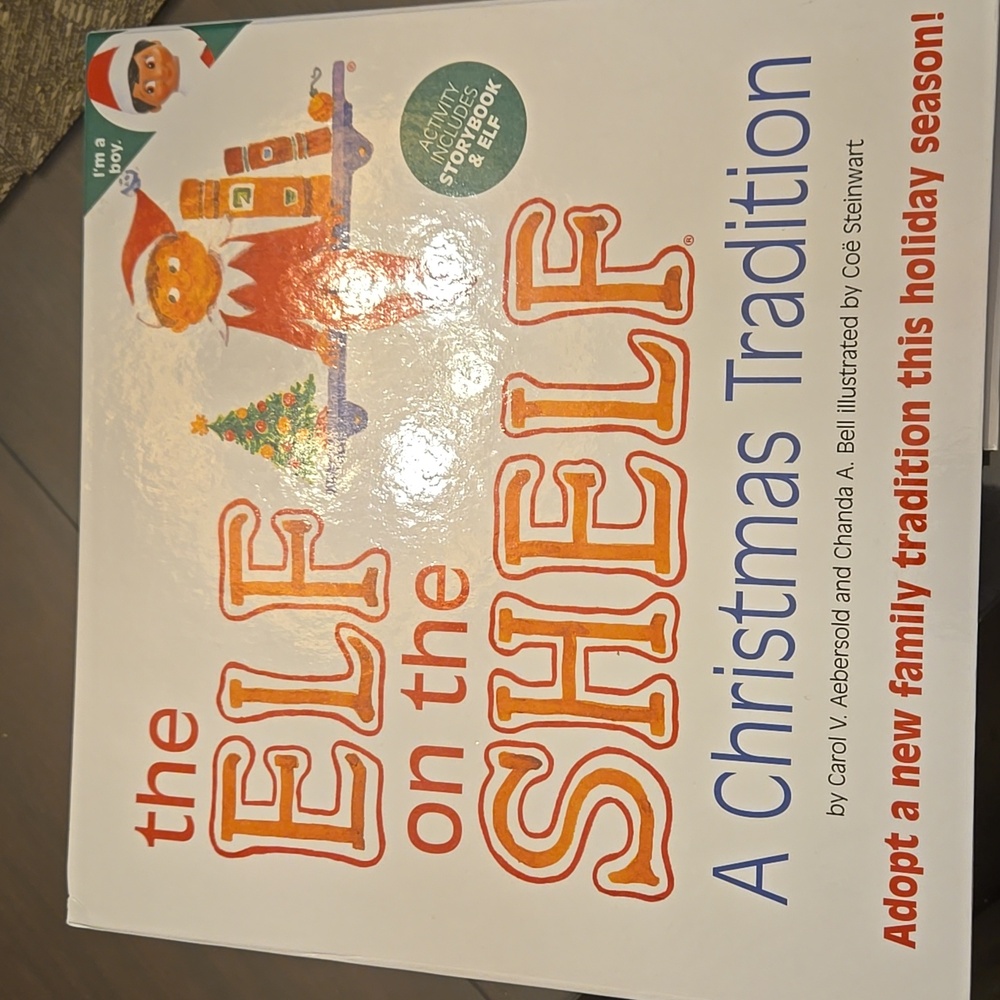 Elf on the Shelf in box, book not included. Also includes accessories!